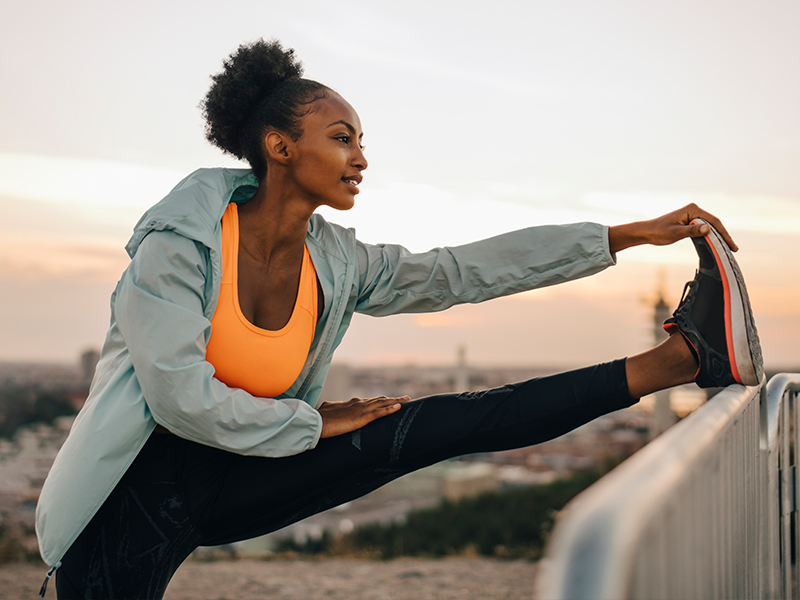 Woman stretching her leg